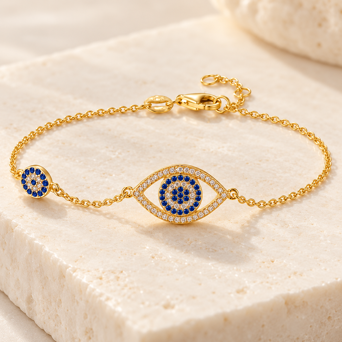Blue evil eye bracelet Gold on cream stone