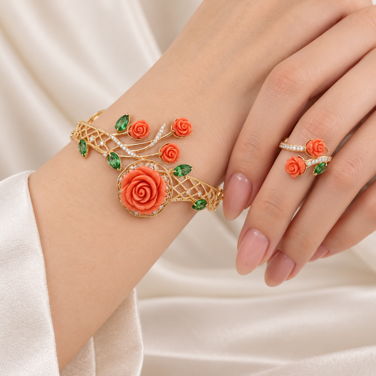 Coral rose bracelet and matching ring on model hand, gold plating