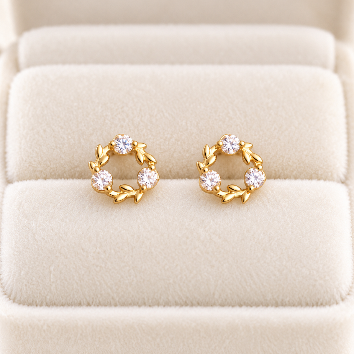 Gold three-stone wreath stud earrings