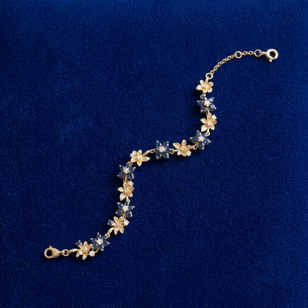 Sapphire Flower Bracelet flat lay on royal blue velvet