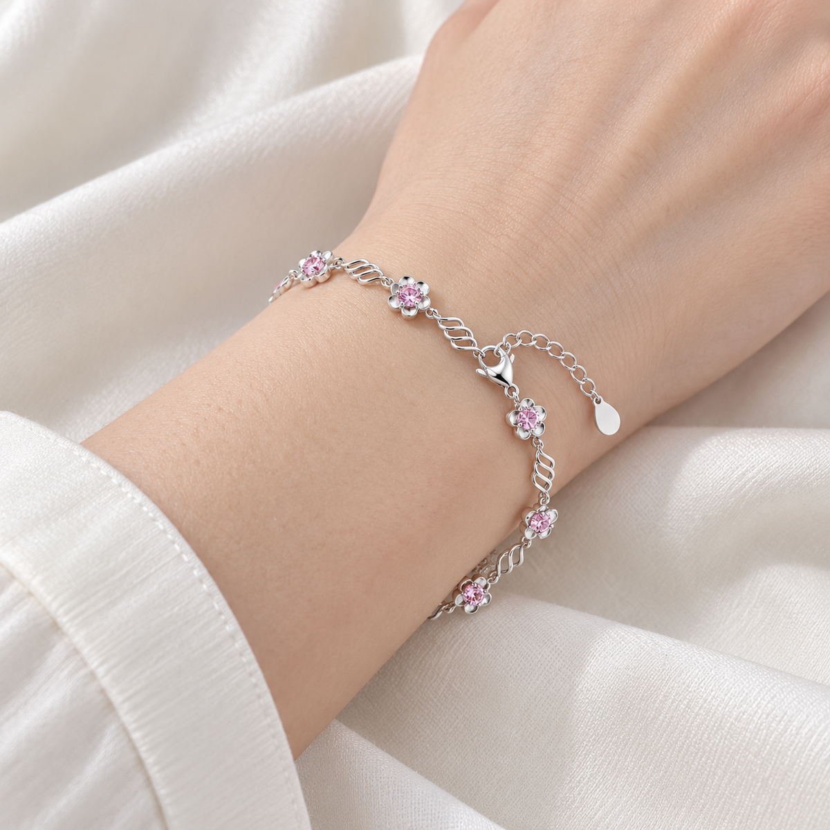 Pink floral ribbon bracelet Silver on wrist