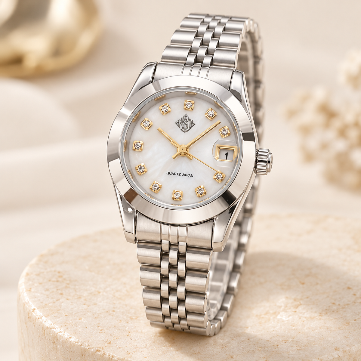NSJ women's silver watch with small emblem on cream stone