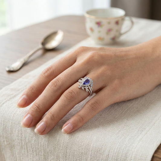 Pear cut violet Ring