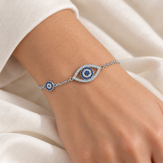 Blue evil eye bracelet Silver on model wrist