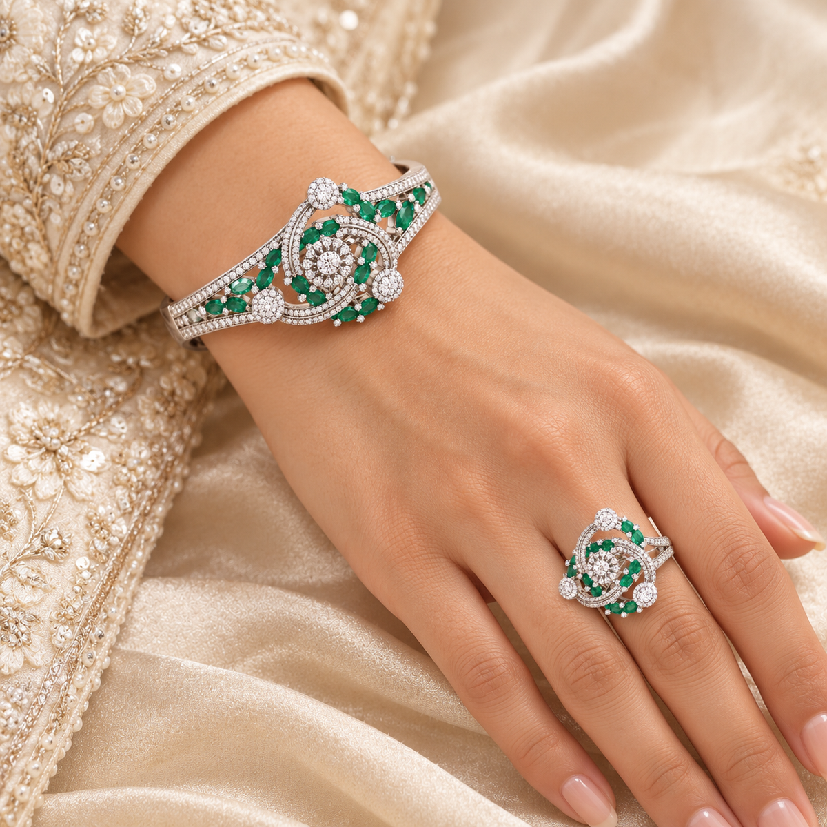 Emerald Orbit bangle and ring on bridal hand
