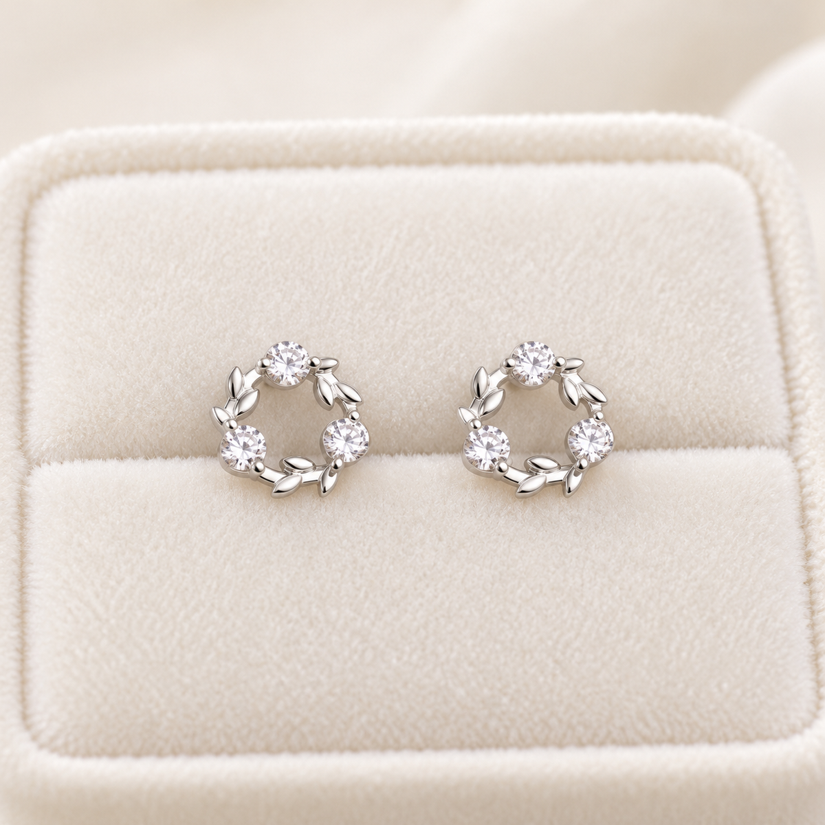 Silver three-stone wreath stud earrings