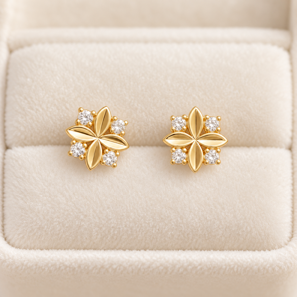 Gold four-petal stud earrings