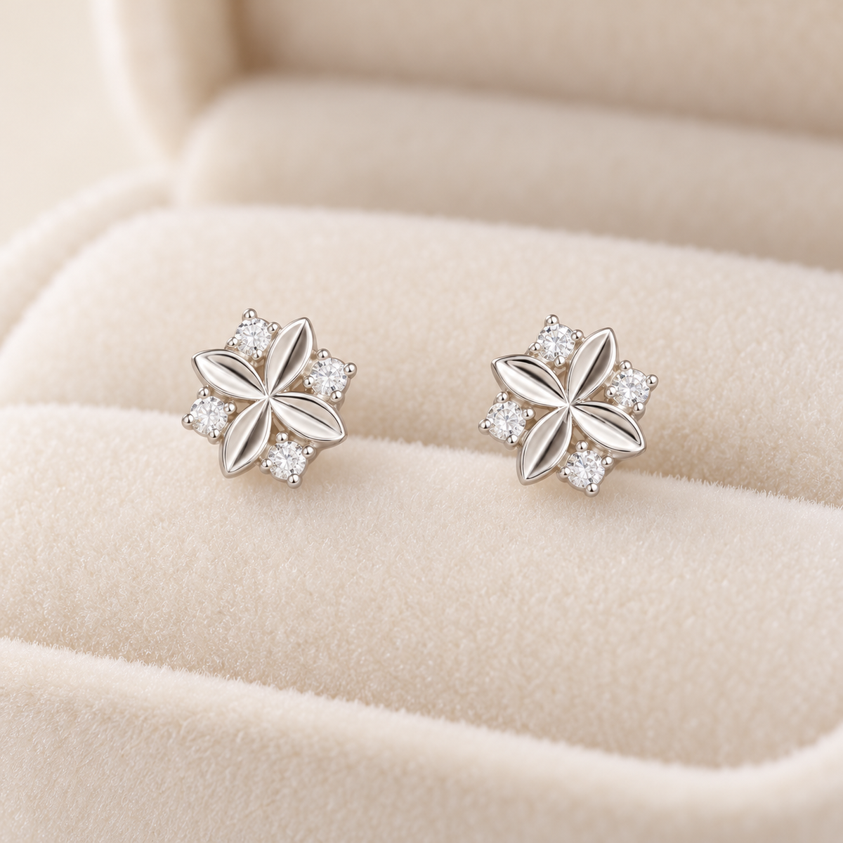 Silver four-petal stud earrings