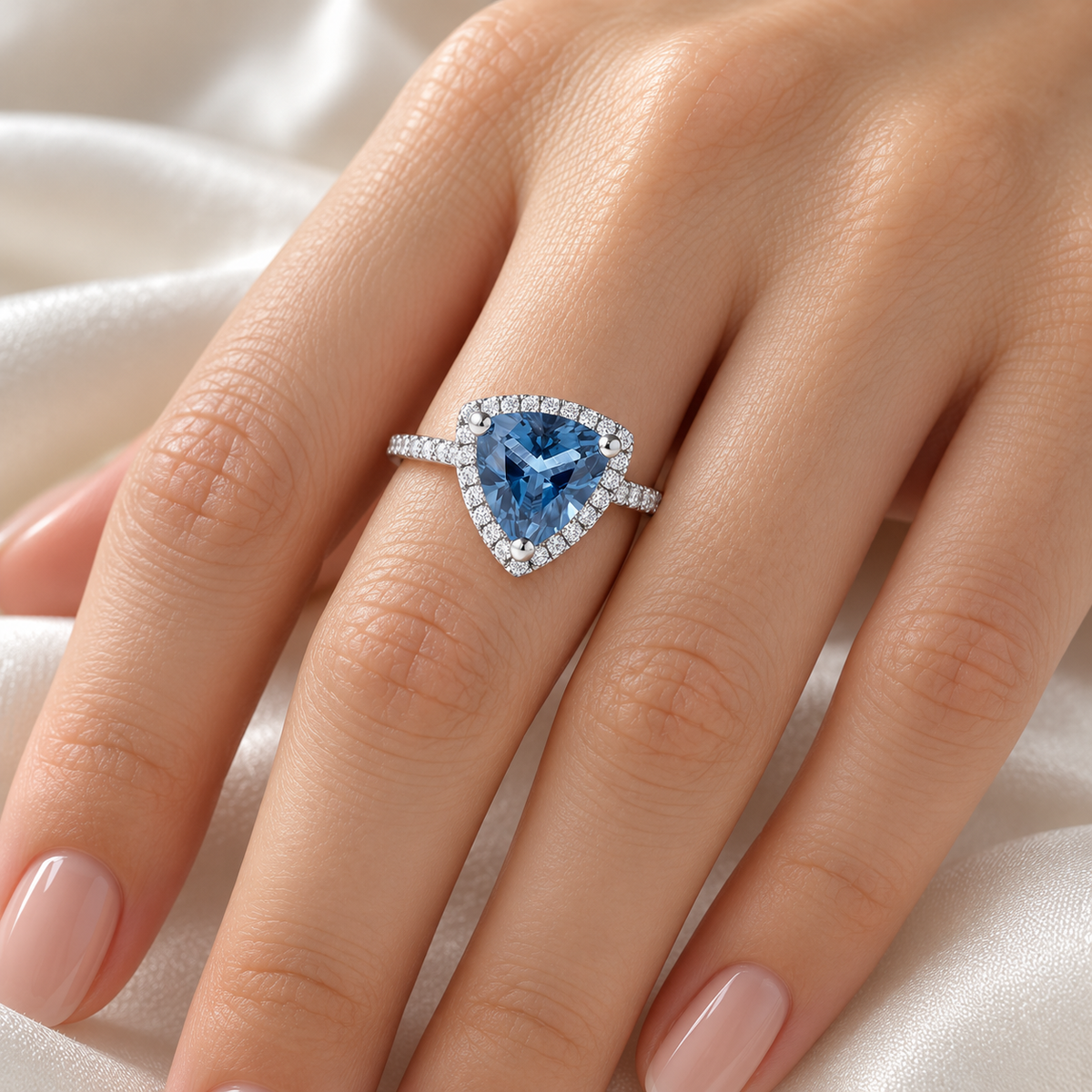 Blue Trillion Halo Ring with slim single-row band