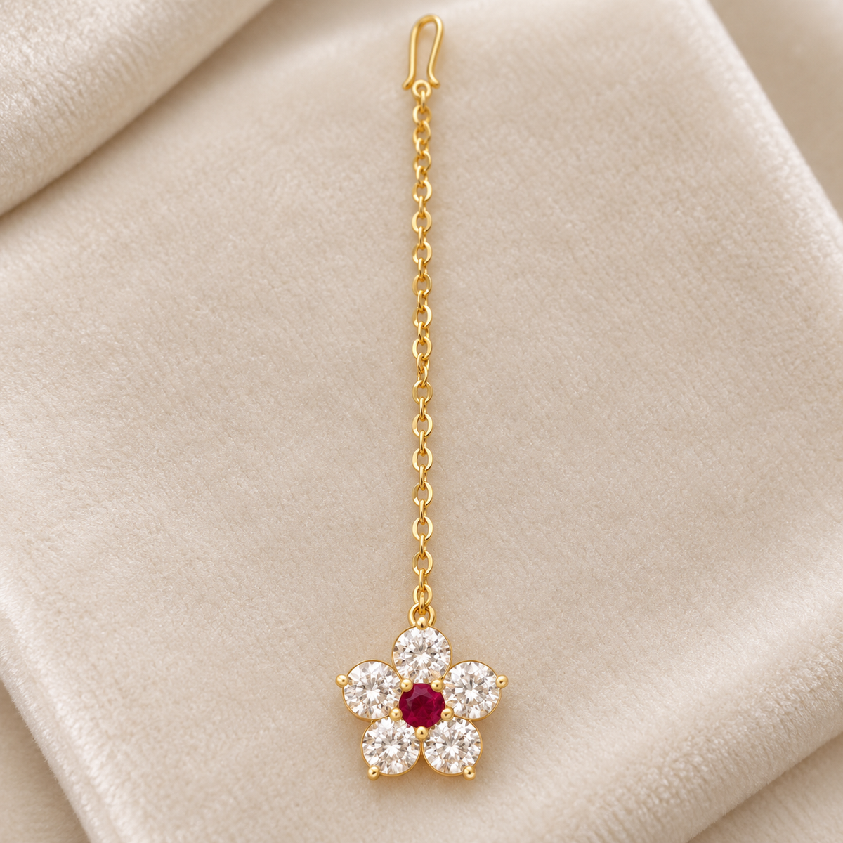 Gold floral maang tikka