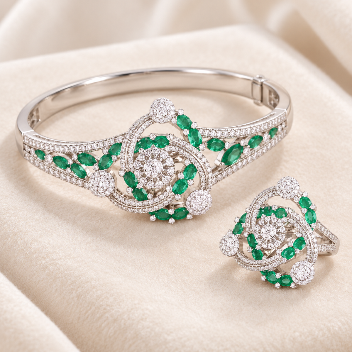 Emerald Orbit bangle and ring set on velvet