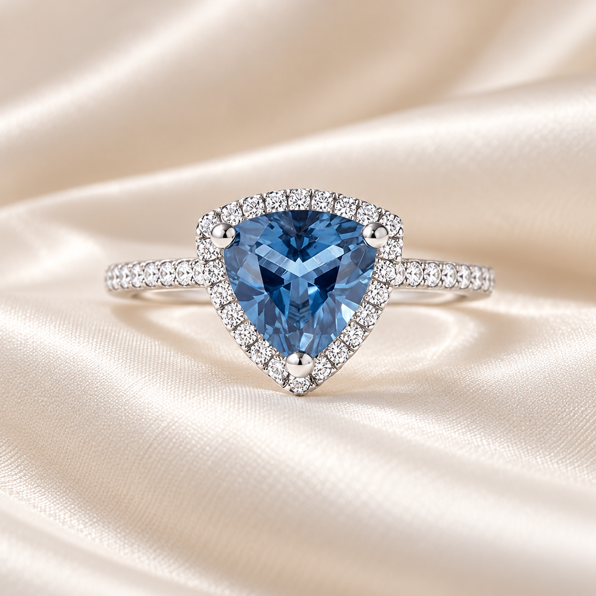 Blue Trillion Halo Ring with slim single-row band