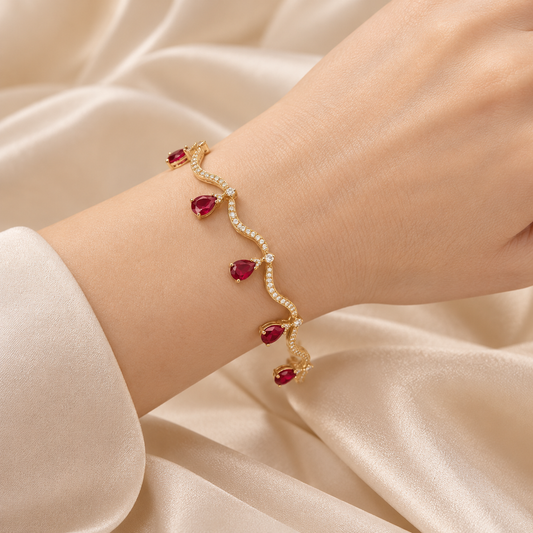 Red Celeste bracelet worn on model wrist
