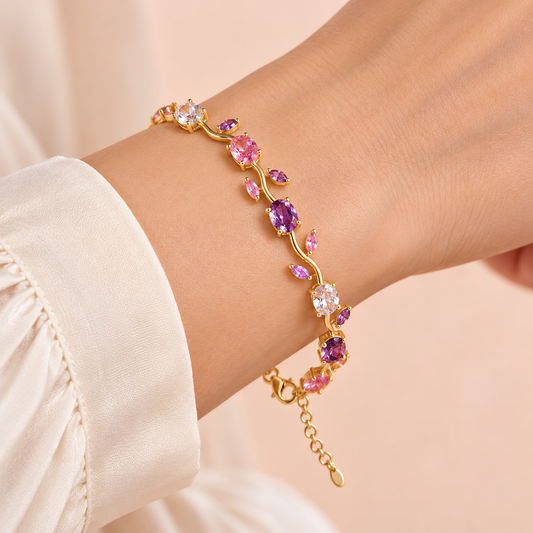 Pink and Purple Leaf Bracelet gold wrist close-up