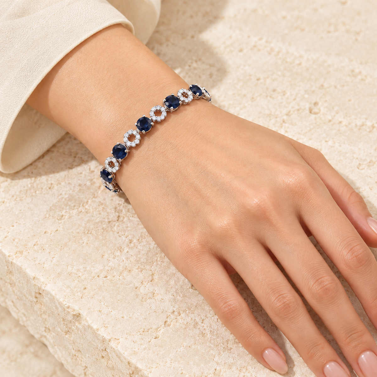 Navy Blue Floral Circle Silver Bracelet manicured hand