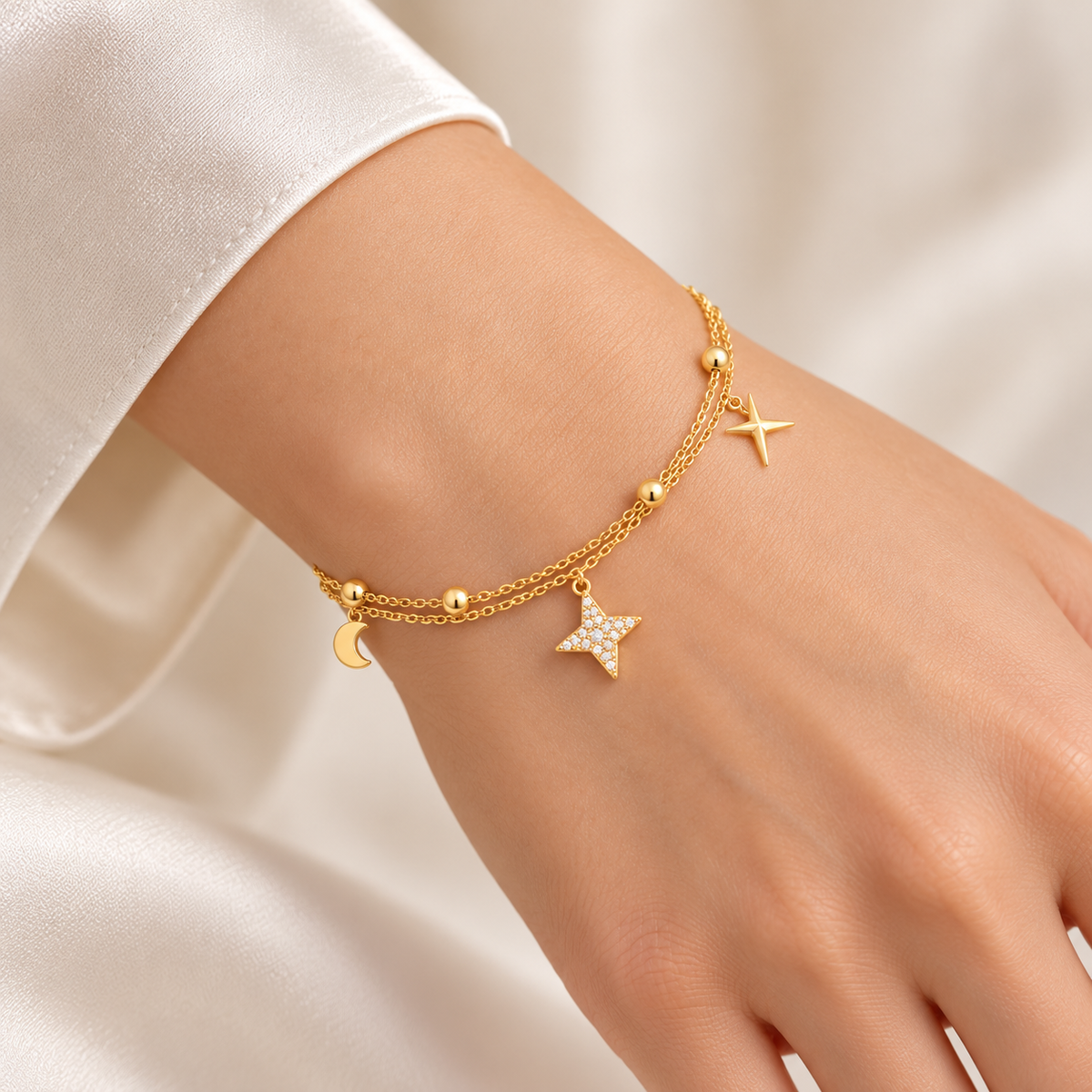 Golden Moon & Star Double Chain Bracelet on model wrist