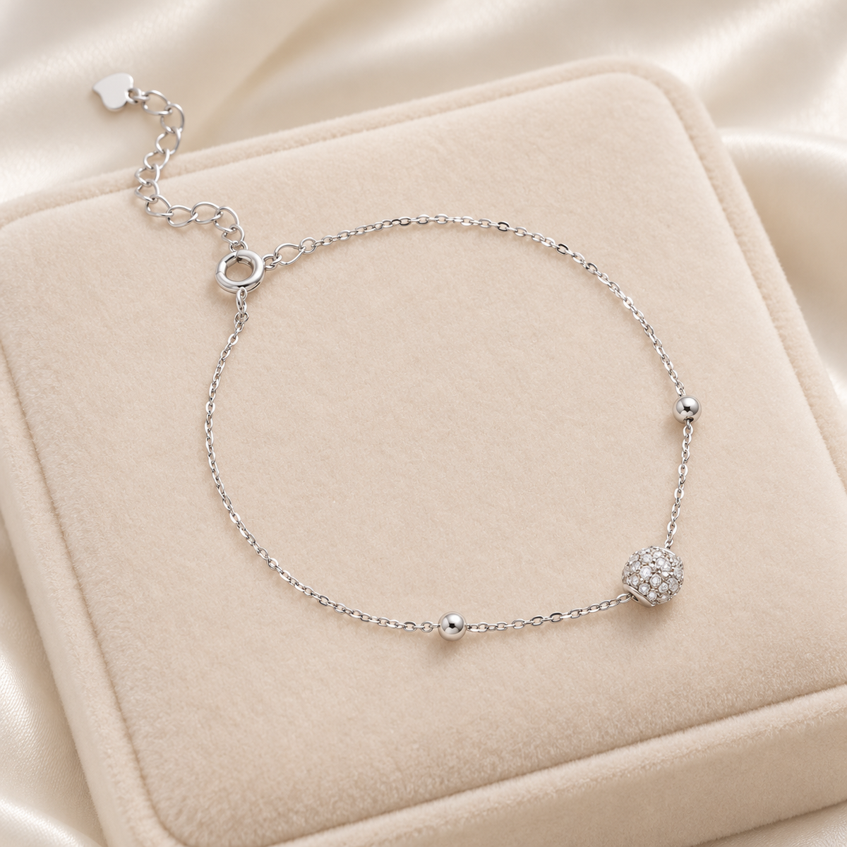 Silver Pavé Ball Bracelet on velvet display