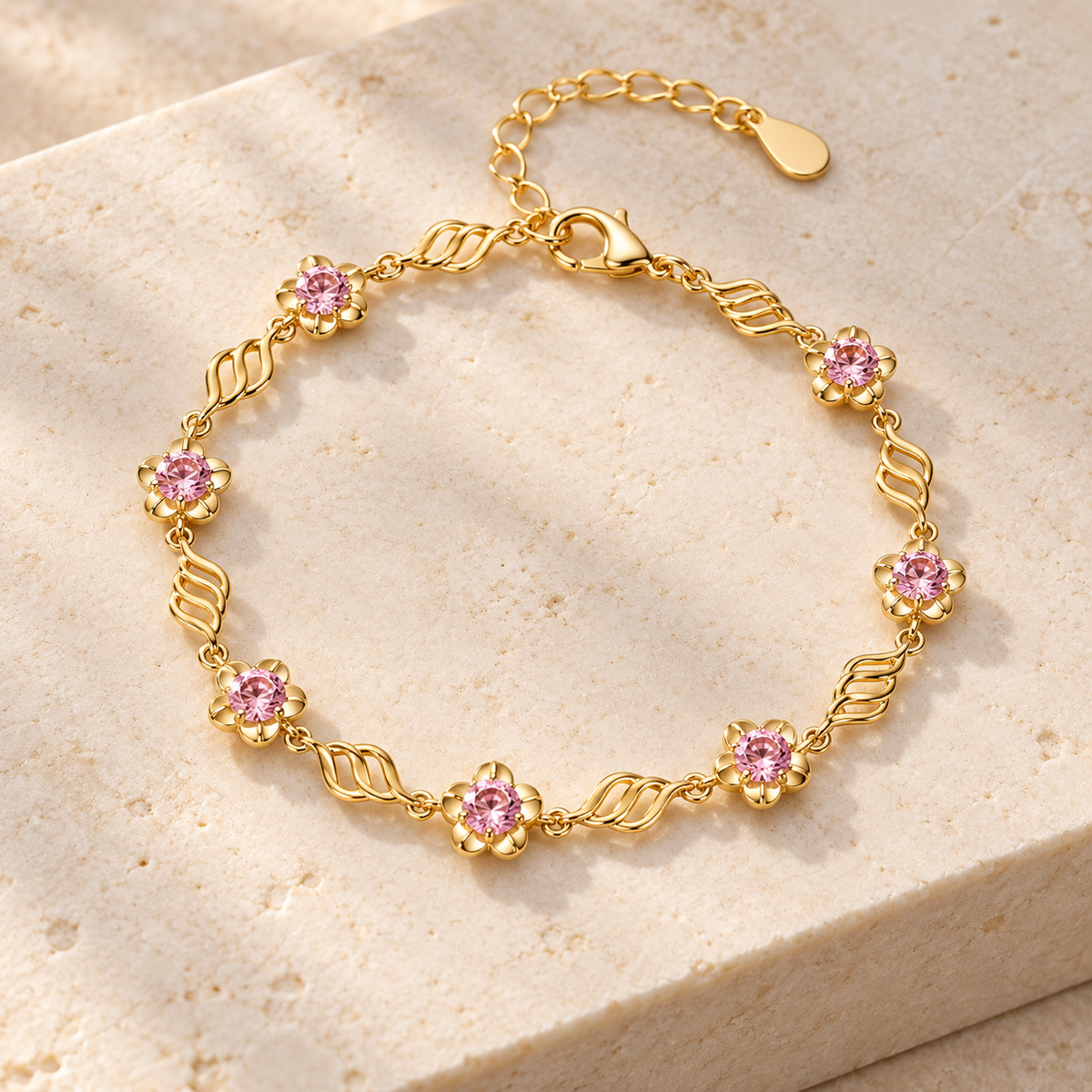 Pink floral ribbon bracelet Gold on cream stone