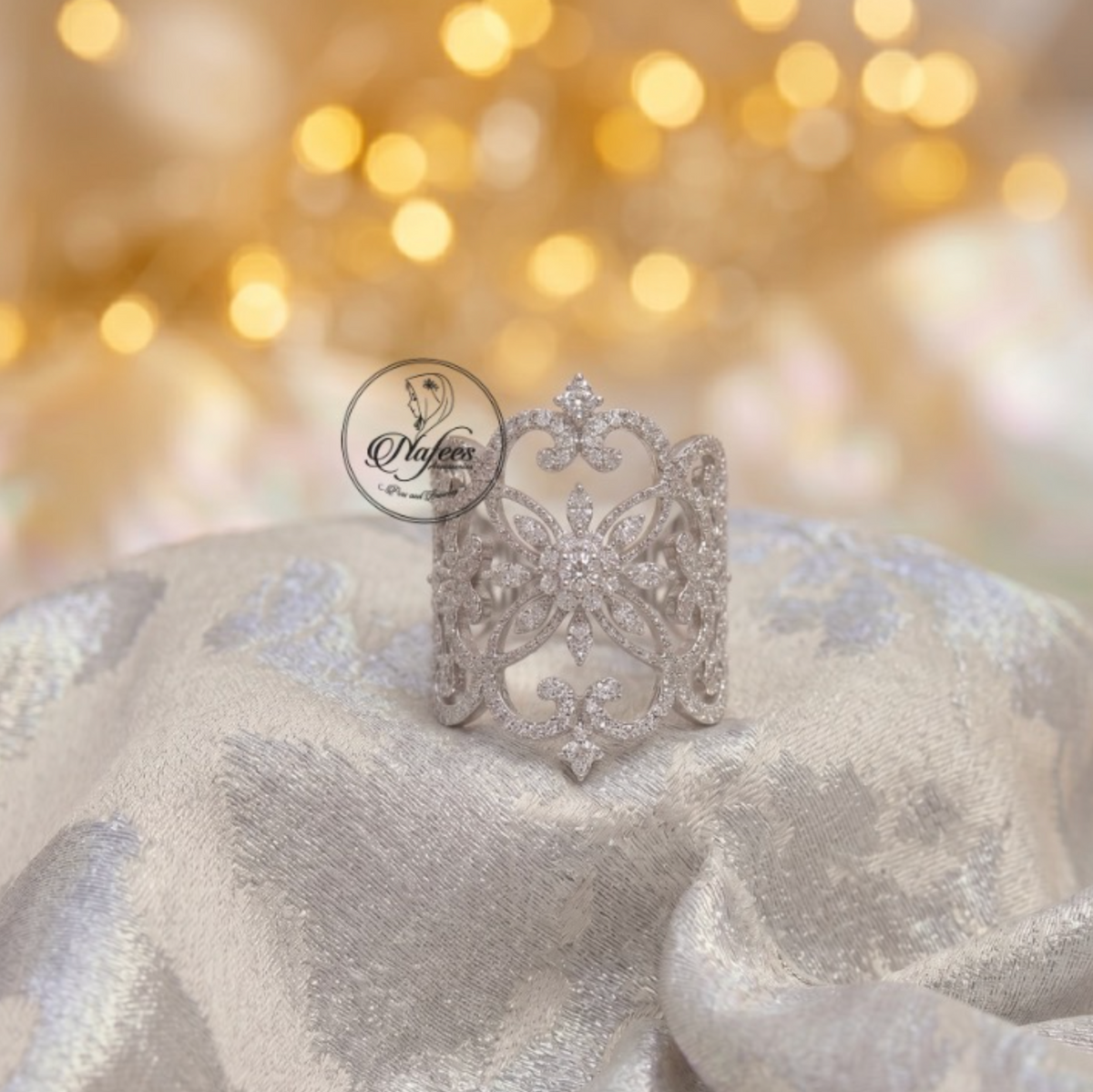 Matching floral filigree silver ring close-up